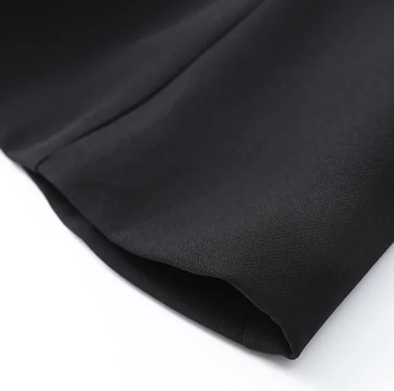 The Noir Contour Cape Top